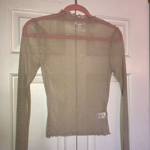 Sheer sparkly beige mock turtleneck